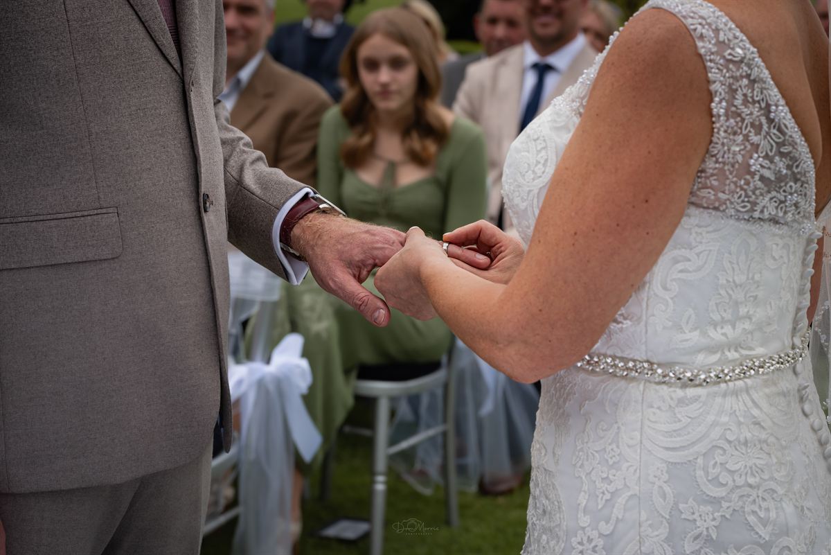 Exchange of vows during wedding ceremony in Burton-Upon-Trent